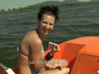 Suntanning Nikol fucked on boat for cash