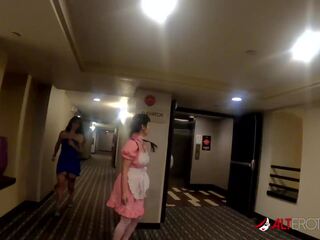 Two big titty babes scissoring with a big toy in a hotel room
