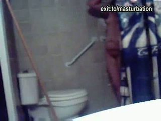 Eline masturbating on the toilet